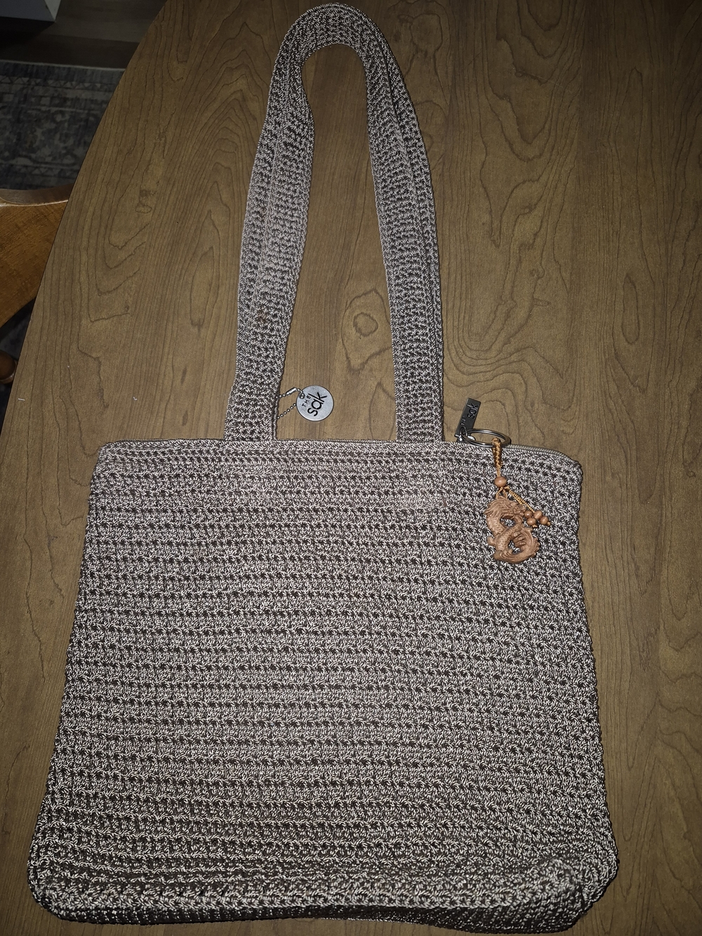 The Sak Taupe Woven Hobo Tote with Charm